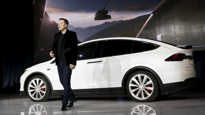 Tesla Motors CEO Elon Musk delivers Model X electric sports-utility vehicles during a presentation in Fremont