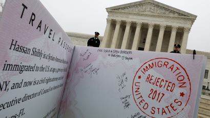 A mock-up of banned Muslim travellers' passport is placed outside the U.S. Supreme Court in Washington