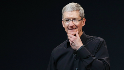 Apple Inc CEO Tim Cook speaks on stage during an Apple event in San Francisco