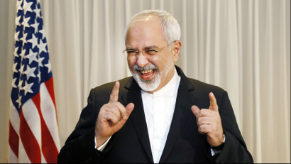 Iranian Foreign Minister Mohammad Javad Zarif talks with reporters before meeting with U.S. Secretary of State John Kerry in Geneva January 14, 2015.