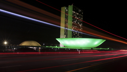 The Brazilian congress is lit up in the colours of the Brazilian national flag ahead of the 2014 World Cup, in Brasilia