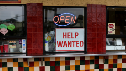 A help wanted sign is posted at a taco stand in Solana Beach, California, U.S