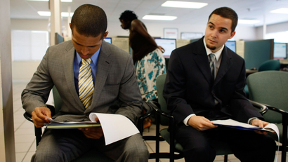 Two applicants prepare for job interview