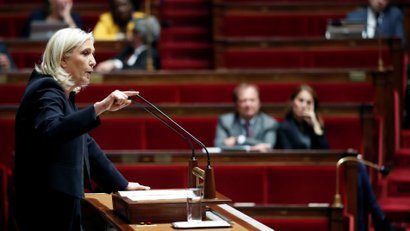 Marine Le Pen, member of parliament and leader of French far-right National Rally (Rassemblement National) party, delivers a speech during a debate on migration at the National Assembly in Paris