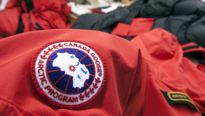 Workers piece together outerwear on the manufacturing floor of Canada Goose's facility in Toronto January 17, 2012. Coat maker Canada Goose found its niche by shunning the make-it-offshore phenomenon, producing its heavy duty down parkas on Canadian soil. Even as Canada's clothing industry crumbles, with employment down 60 percent in just over a decade, the 55-year old family-run shop bucked the broader trend of moving production to low-cost locales by keeping manufacturing at home. Picture taken January 17. To match Analysis CANADA-NICHE/ REUTERS/Fred Thornhill (CANADA - Tags: BUSINESS TEXTILE)