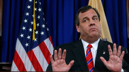 Republican Governor of New Jersey stands with palms up