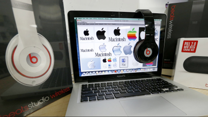 apple logos and beats headphones