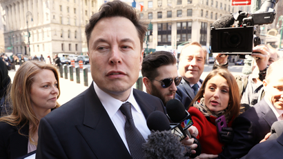 Elon Musk looking unhappy