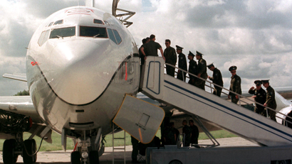 UKRAINIAN OFFICERS ENTER THE U.S. OBSERVATION AIRCRAFT IN KIEV.