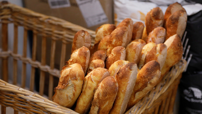A number of baguettes in a basket.