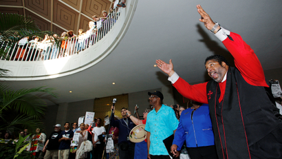 Reverend Doctor William Barber II, president of the NAACP's North Carolina chapter and leader of the "Moral Monday" civil rights protests, speaks against the state's HB2 "bathroom law" that restricts members of the LGBT community from using the bathroom of their choice, during a demonstration inside the rotunda of the state legislature in Raleigh, North Carolina on May 16, 2016.