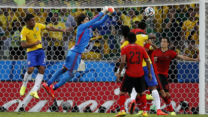 Mexico's Ochoa catches ball in match with Brazil