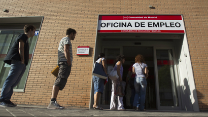 People enter a government-run employment office in Madrid.