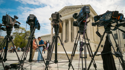 TV cameras outside the US Supreme Court during arguments in the Aereo case