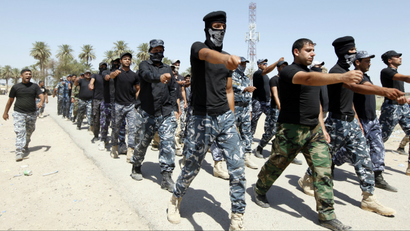 Shi'ite volunteers training in Baghdad on July 9, 2014.