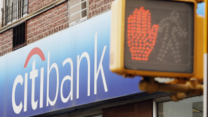 Pedestrian signals can be seen outside of a Citibank branch in New York