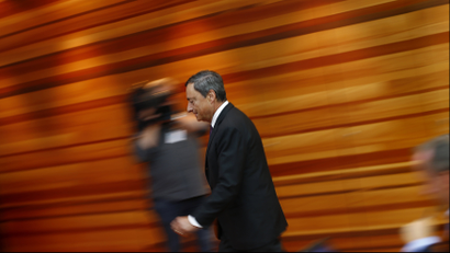 Mario Draghi, President of the European Central Bank (ECB), arrives for the ECB's monthly news conference in Frankfurt.