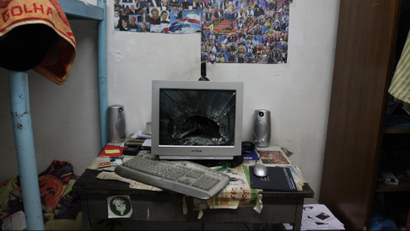 The smashed computer of a Tehran University student who supported the opposition in the 2009 elections.