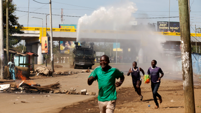 Kenyan anti-riot police deploy a water cannon during clashes with supporters of Kenyan opposition leader Raila Odinga, in Kisumu, Kenya, October 26, 2017.