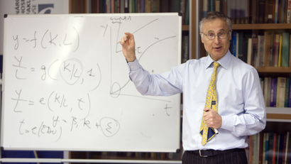 Italian economist Enrico Colombatto lectures at the University of Economics.