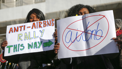 Opponents of Airbnb rally in New York.
