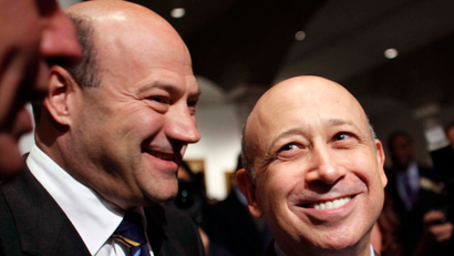 Goldman Sachs CEO Blankfein and his colleague Cohn (L), president and COO