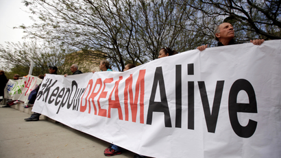 Members of the Border Network for Human Rights and Borders Dreamers and Youth Alliance (BDYA) hold a banner during protest outside a U.S. Federal Courthouse to demand that Congress pass a Clean Dream Act in El Paso, Texas, U.S. March 5, 2018.
