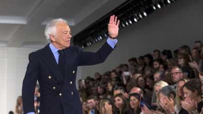 Designer Ralph Lauren greets the crowd after presenting his Spring/Summer 2016 collection during New York Fashion Week in New York, September 17, 2015.