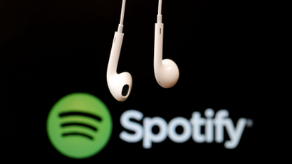 Spotify logo with headphones dangling