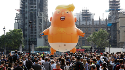 Demonstrators fly a blimp portraying U.S. President Donald Trump, in Parliament Square, during the visit by Trump and First Lady Melania Trump in London