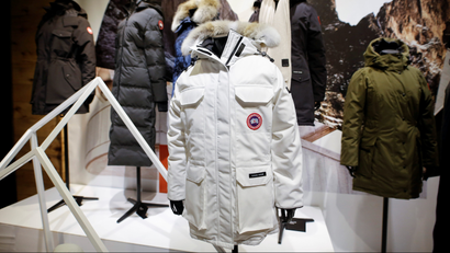Jackets hang in the showroom of the Canada Goose factory in Toronto, Ontario