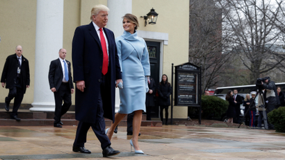 President-elect Donald Trump and his wife Melania depart from services at St. John's Church during his inauguration in Washington, U.S., January 20, 2017. REUTERS/Joshua Roberts