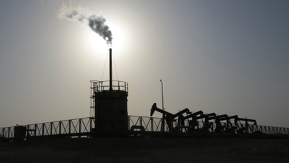 Oil pumps at work in the desert oil fields of Sakhir, Bahrain.