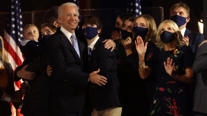 Joe Biden and his grandchildren on stage