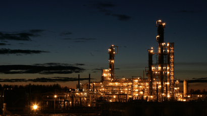 The Achinsk Oil Processing Plant is lit up at night in the Siberian city of Achinsk 154km (94 miles) west of Krasnoyarsk