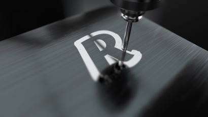 A machine tool etches information onto a Revolut payment card