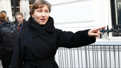 Marina Litvinenko, widow of murdered KGB agent Alexander Litvinenko gestures as she makes her way back to the High Court in central London, January 27, 2015.