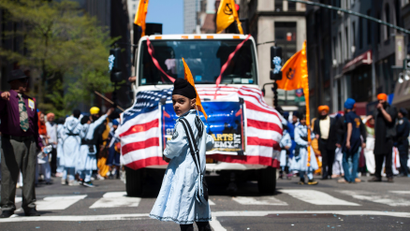 A Sikh boy marches in the annual Sikh Day Parade in New York
