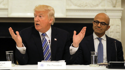 U.S. President Donald Trump participates in an American Technology Council roundtable, accompanied by Tim Cook, CEO of Apple (L) and Satya Nadella CEO of Microsoft Corporation at the White House in Washington, U.S., June 19, 2017.