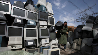 trash pile of old computers