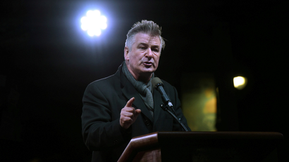 Actor Alec Baldwin speaks at a protest against U.S. President-elect Donald Trump outside the Trump International Hotel in New York City