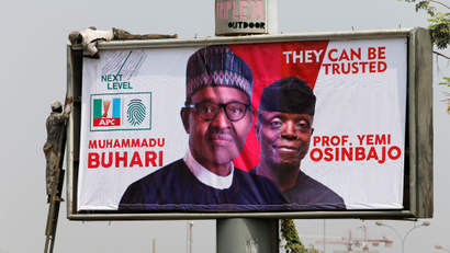 A campaign banner for the 2019 elections showing Muhammadu Buhari and Yemi Osinbajo