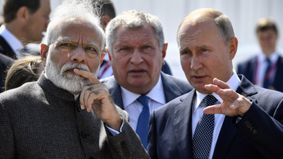 Russian President Putin and Indian Prime Minister Modi visit Zvezda shipyard accompanied by Rosneft Russian oil giant chief Sechin in Vladivostok