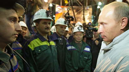 Vladimir Putin talks to mine workers in the city of Mirny in Eastern Siberia.