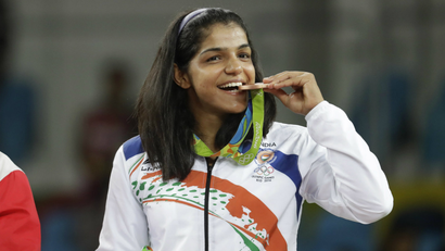 India's Sakshi Malik poses with her bronze medal.