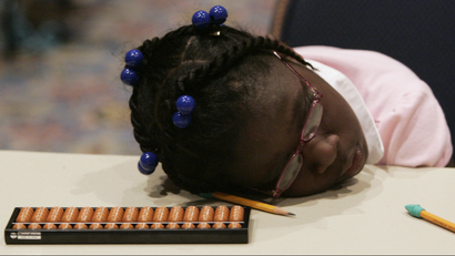 black girl sleeping on pencils