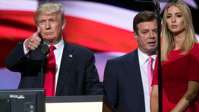 In this photo taken July 21, 2016, then-Trump Campaign manager Paul Manafort stands between the then-Republican presidential candidate Donald Trump and his daughter Ivanka Trump during a walk through at the Republican National Convention in Cleveland. Manafort, secretly worked for a Russian billionaire to advance the interests of Russian President Vladimir Putin a decade ago and proposed an ambitious political strategy to undermine anti-Russian opposition across former Soviet republics, The Associated Press has learned.