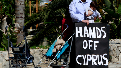 A child and protest banner in Cyprus