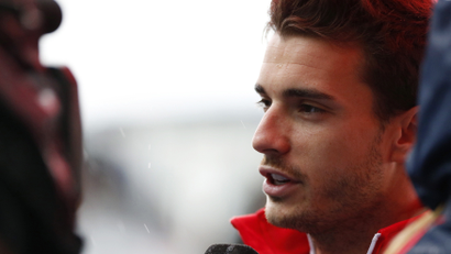 Marussia Formula One driver Jules Bianchi of France speaks to the media after a news conference at the Suzuka circuit October 2, 2014. French driver Bianchi was taken to hospital after being seriously injured in a crash that brought a halt to a wet Japanese Formula One Grand Prix on Sunday. Picture taken October 2, 2014. REUTERS/Yuya Shino