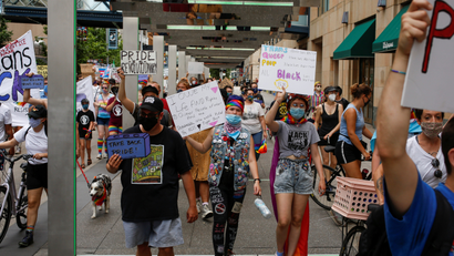 People march to support the LGBTQ community and the Black Lives Matter movement in Minneapolis, Minnesota, U.S., June 28, 2020.